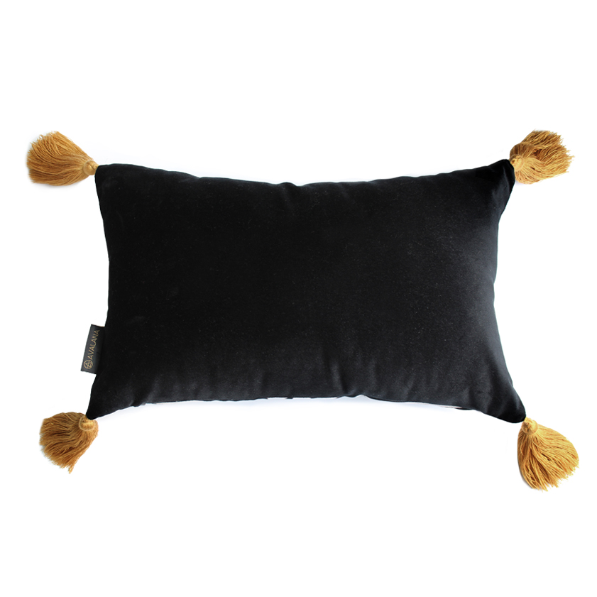 black velvet cushion with mustard tassels