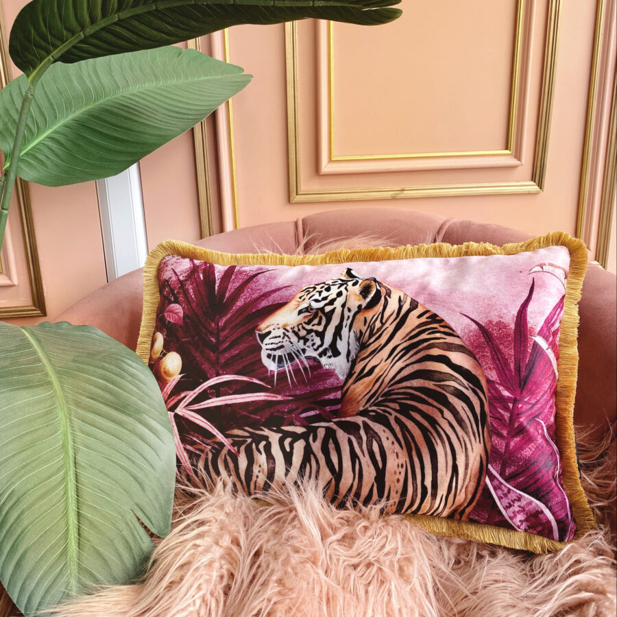Pink and orange jungle velvet cushion