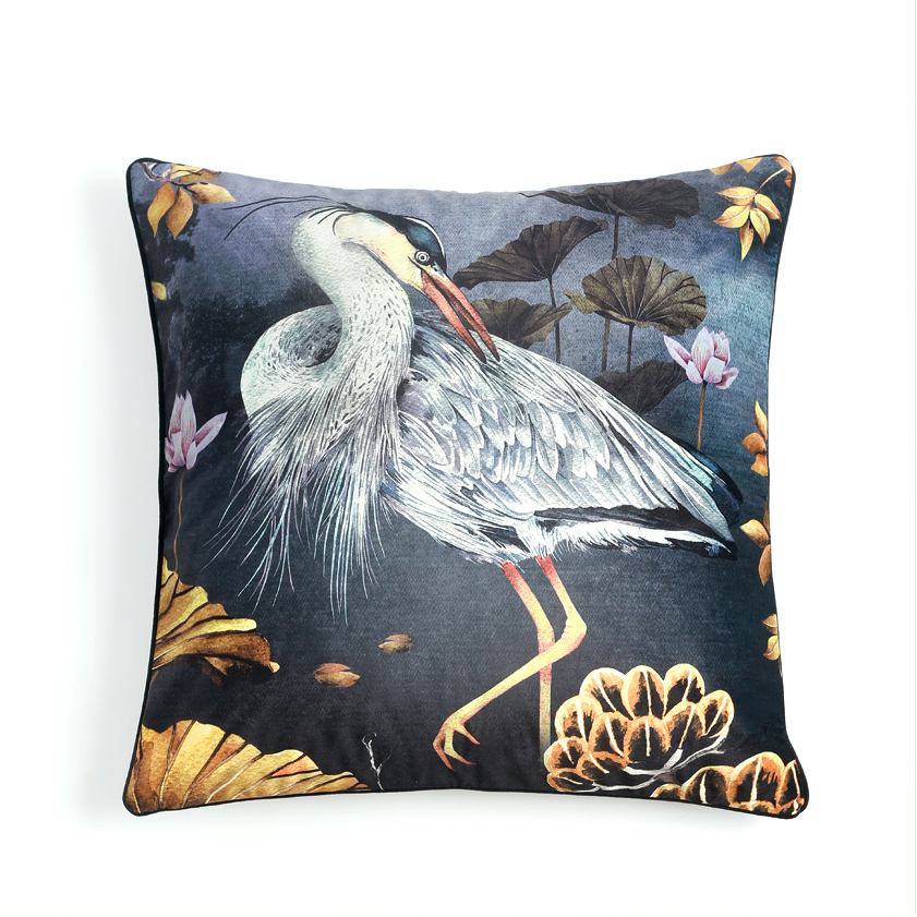 a painted grey blu heron on a black velvet cushion