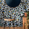 Inky Leo indigo wallpaper in a hallway surrounded by oak furniture