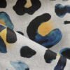 inky leopard indigo on oyster linen fabric