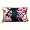 Noir blooms fringe velvet cushion cover. A black background with handprinted florals growing in from the side